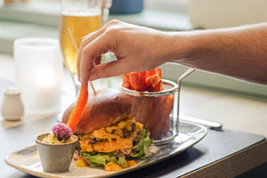 Burger im Wellengang